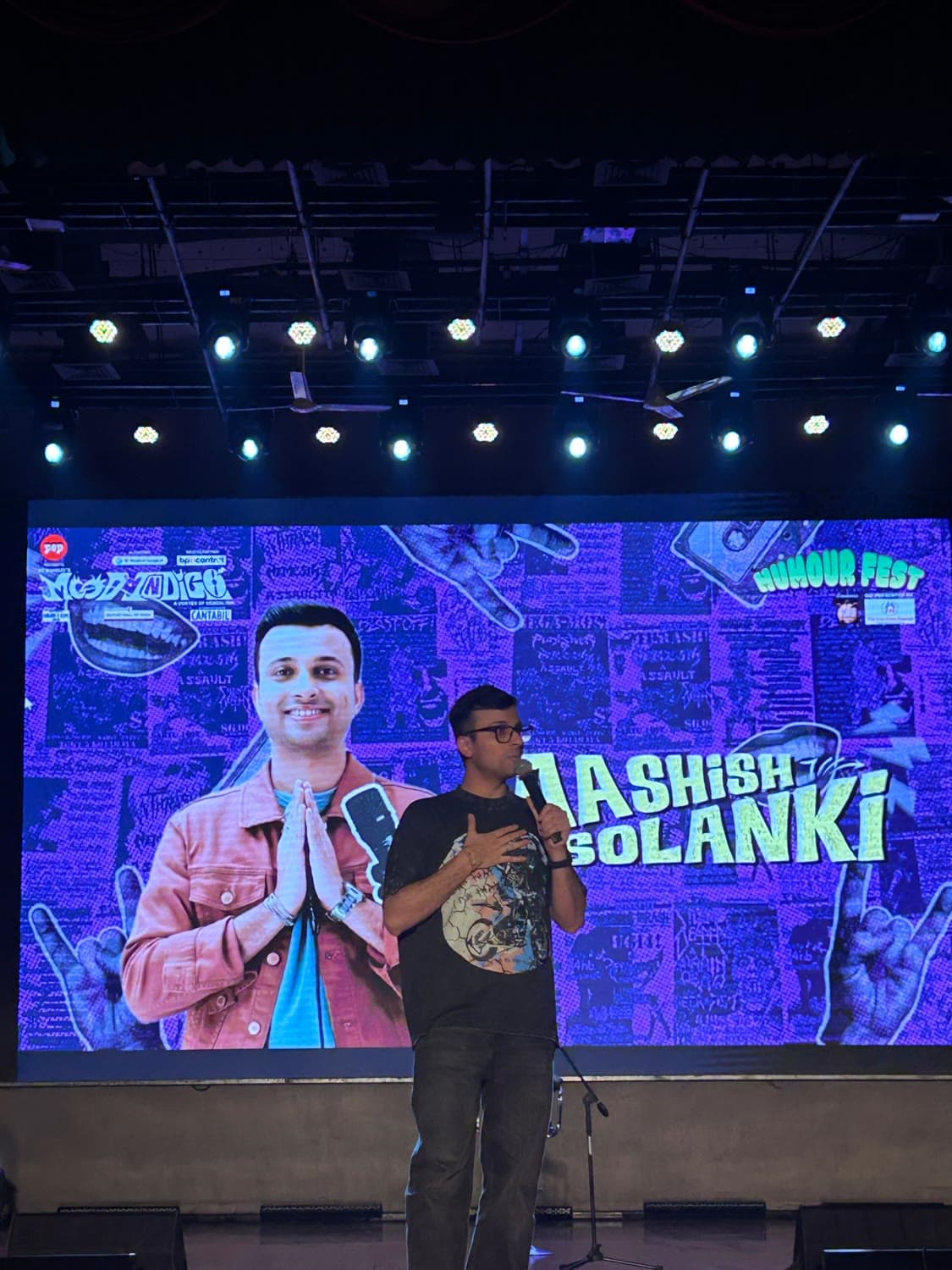 A comedian mid-set at Mood Indigo's humour fest